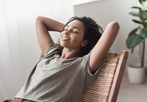 Patient in Jefferson relaxing after getting dental implants