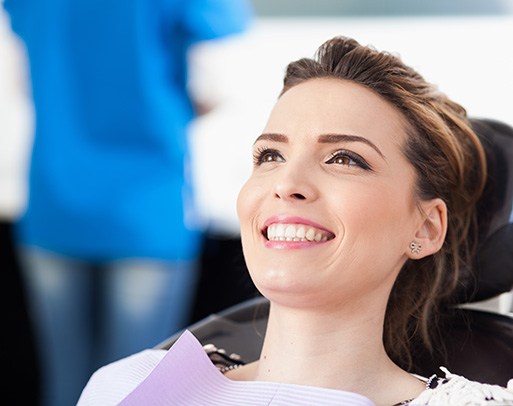 Someone smiling in a dentist’s chair